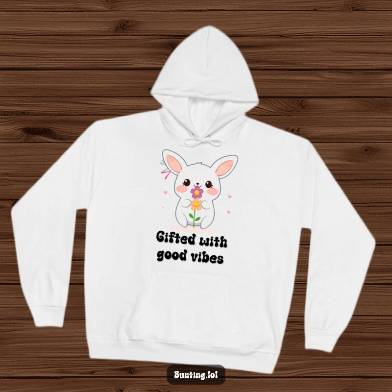 Funny Bunting Hoodie featuring a smiling bird offering a flower, evoking warmth and generosity.