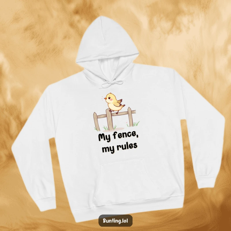Funny Hoodie: A small, vibrant bird energetically hops along a fence post, creating a cozy and humorous visual.
