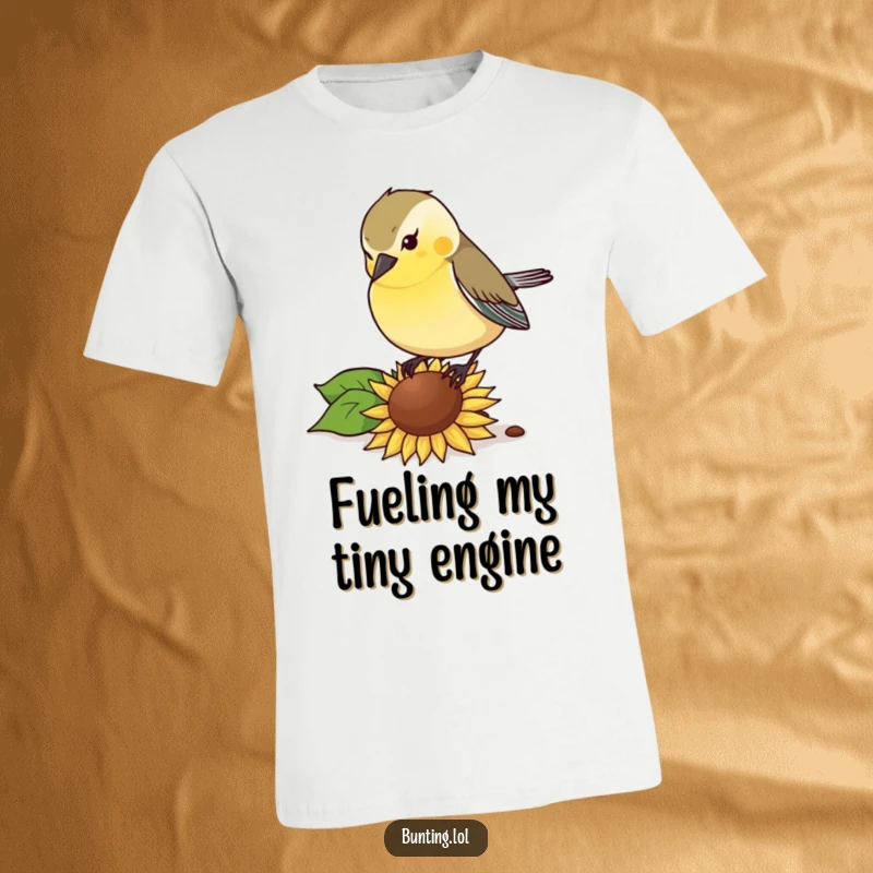 Funny T-Shirt: Bunting bird pecking with gusto at a sunflower seed, capturing a funny and determined moment.