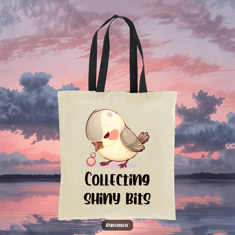 Funny tote bag illustrating a curious bird pecking at a small, shiny bead, perfect for carrying essentials with humor.